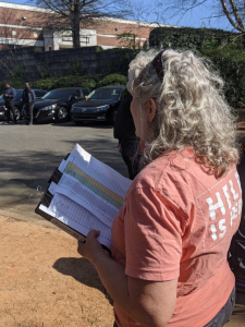 Protestors with list of license plates (redacted) of those who visit a Planned Parenthood site in Charlotte, North Carolina